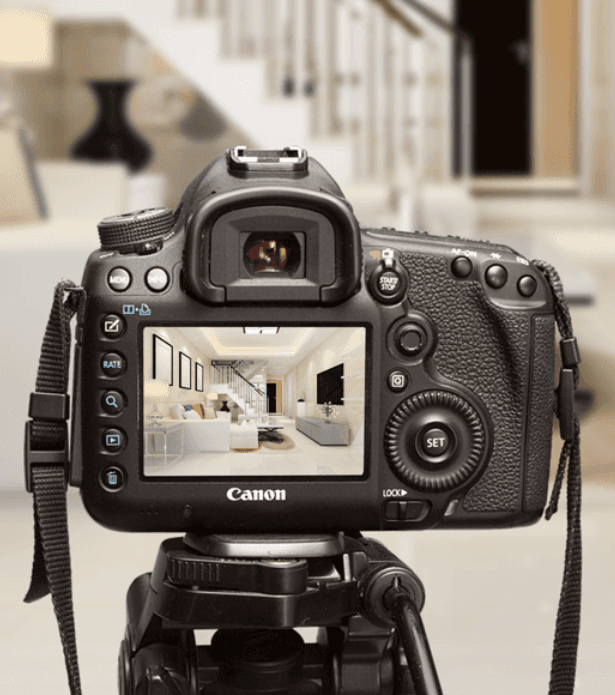 A camera set up to photograph a property